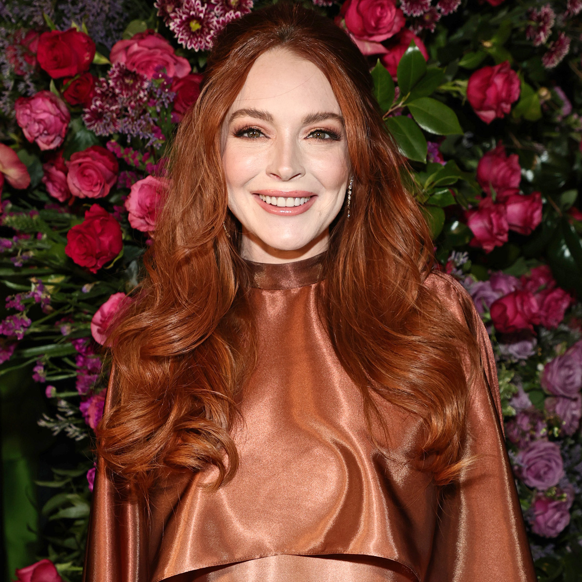 Pregnant Lindsay Lohan Debuts Her Baby Bump in First Photo