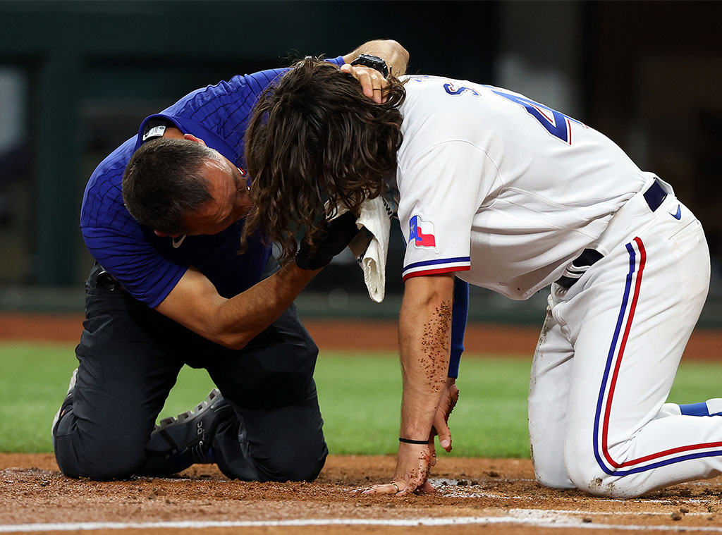 Rangers' Smith goes to hospital after hit in face with pitch
