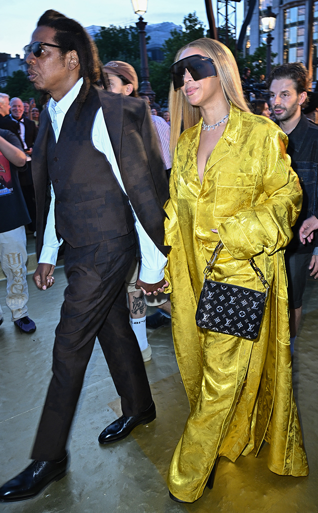 Pregnant Rihanna, A$AP Rocky match in denim at Louis Vuitton show