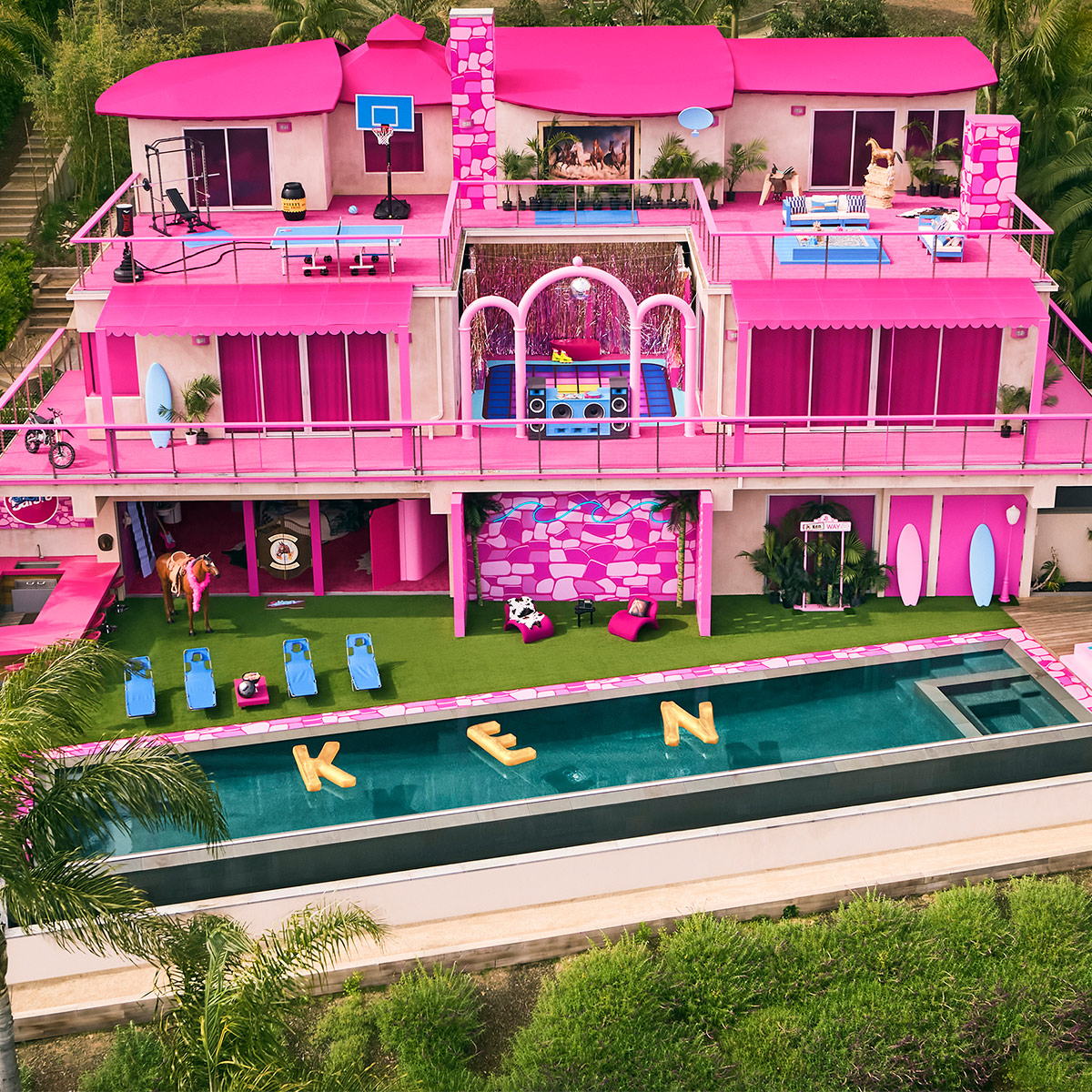 Barbie and Ken unveil bright-pink lifesize dollhouse in Malibu