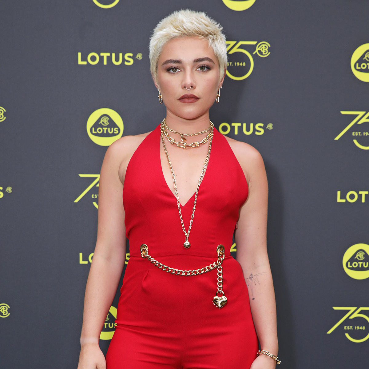 Florence Pugh Rocks Faux-Hawk and Nipple-Baring Dress at Golden Globes