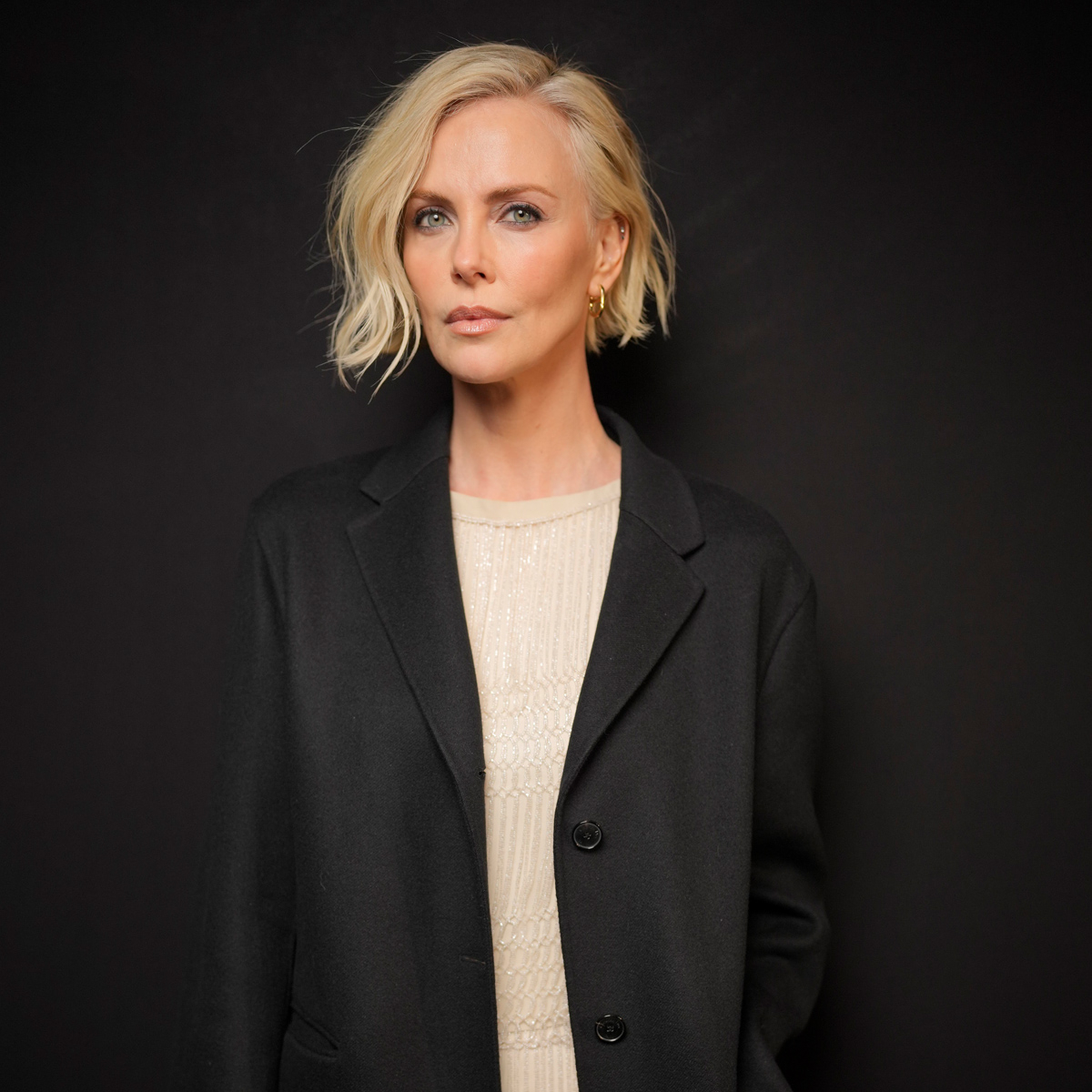Charlize Theron Reveals She’s “Still Recovering” From This ’90s Trend