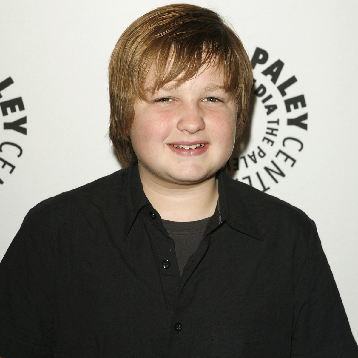 Two and a Half Men’s Angus T. Jones Steps Out With a Flip Phone