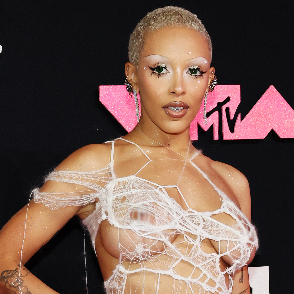 Doja Cat Frees the Nipple in Sexy Spiderweb Look at the 2023 MTV VMAs