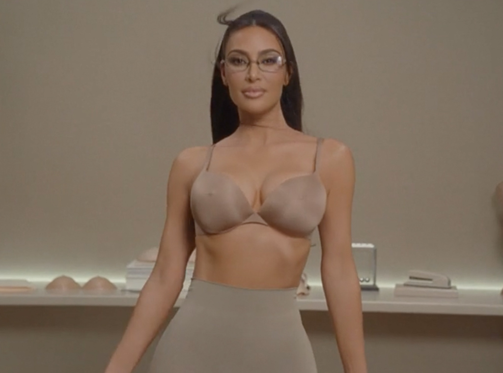 Kim Kardashian poses in her new beige satin bra and undies