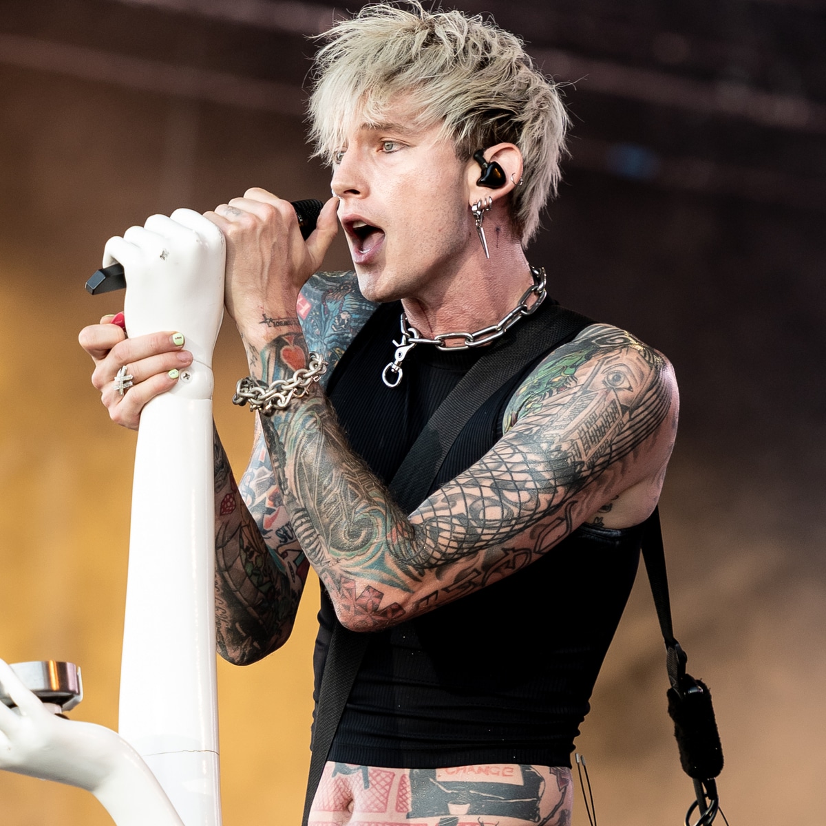 Machine Gun Kelly Unveils Shocking New Tattoos
