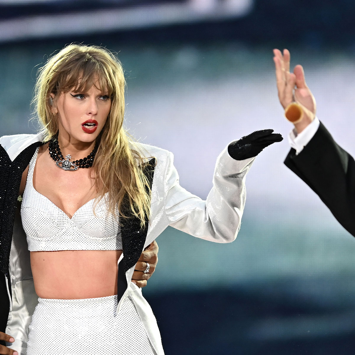 Travis Kelce Makes Surprise Onstage Appearance at Taylor Swift’s Show