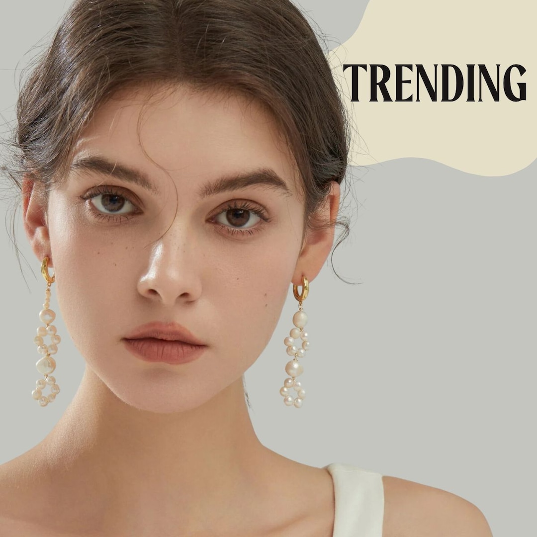 The Most Stylish Earrings To Wear This Summer, From Hoops to Huggies – E! Online The Most Stylish Earrings To Wear This Summer, From Hoops to Huggies – E! Online