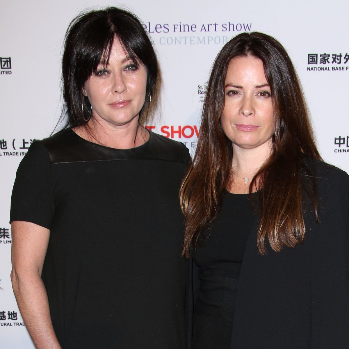Charmed’s Holly Marie Combs Honors Late “Fighter” Shannen Doherty