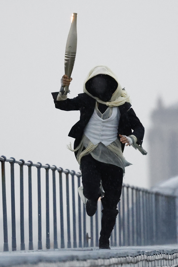 Masked Torchbearer, Olympics 2024, Paris Olympics, Opening Ceremony