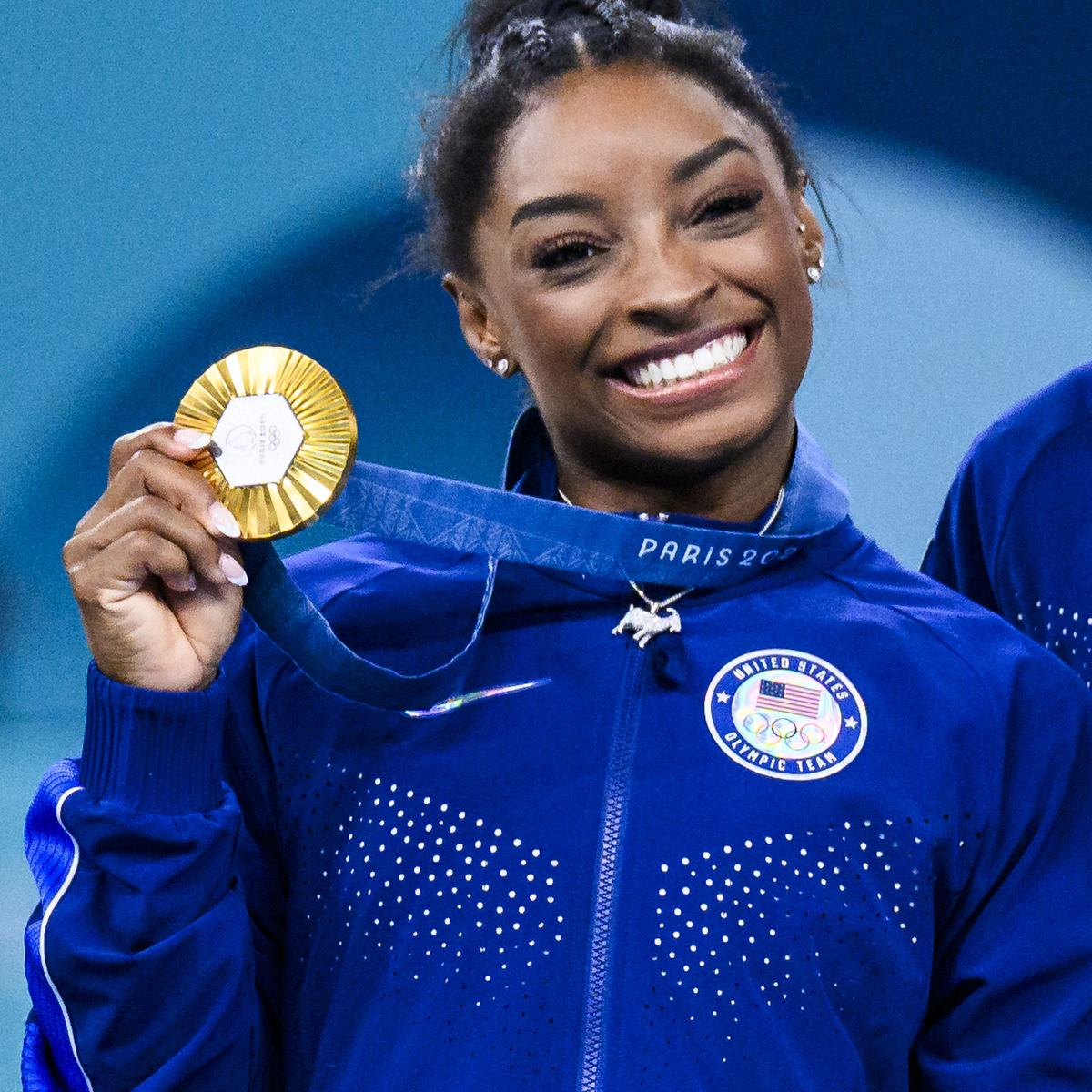 Simone Biles’ Necklace Proves She’s the GOAT After Gold Medal Win