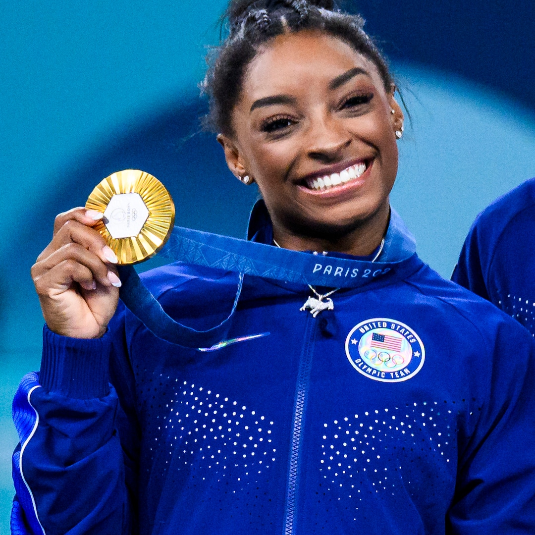 Simone Biles’ 2024 Olympics Necklace Proves She’s the GOAT After Gymnastics Gold Medal Win – E! Online Simone Biles’ 2024 Olympics Necklace Proves She’s the GOAT After Gymnastics Gold Medal Win – E! Online