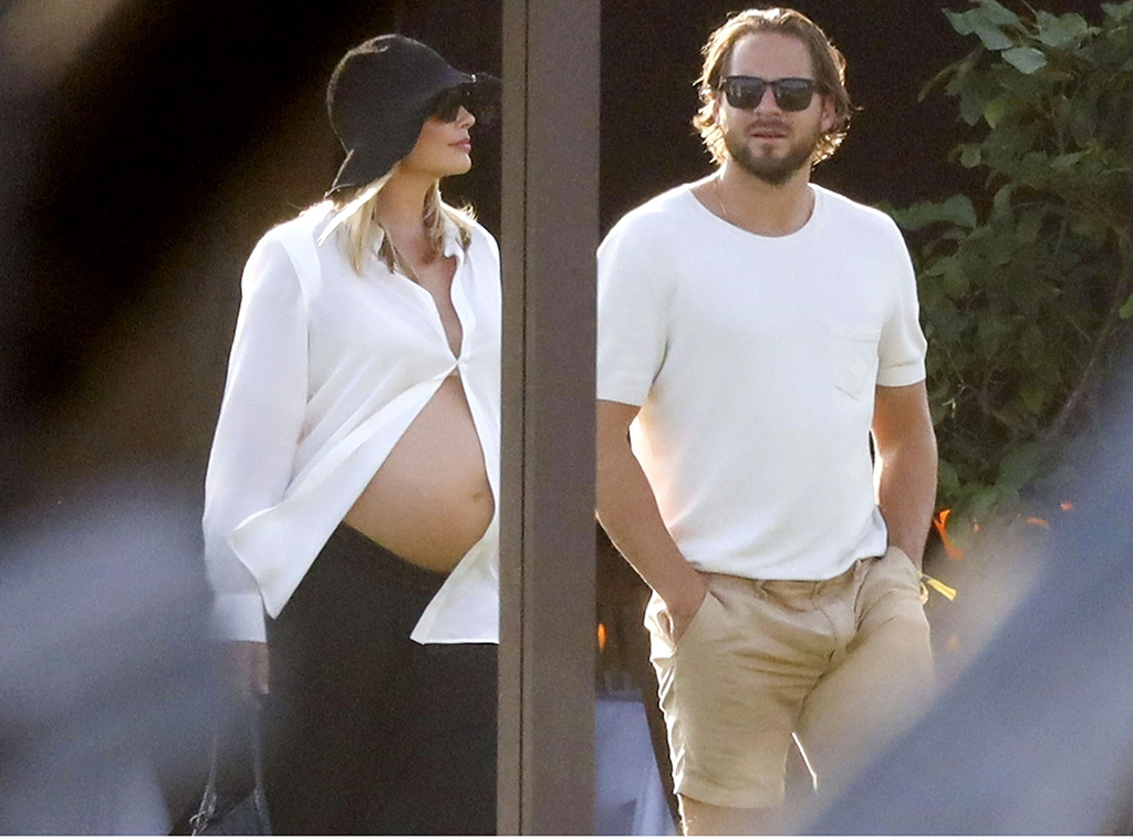 Margot Robbie Puts Baby Bump on Display During Trip With Tom Ackerley