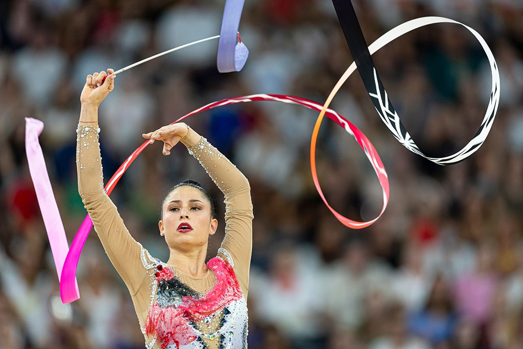 Die olympische Turnerin Suni Lee erklärt, warum sie vom Schwebebalken gefallen ist