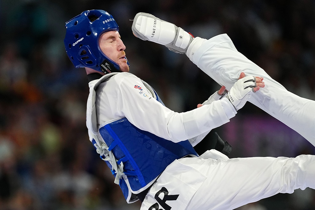 La gimnasta olímpica Suni Lee explica por qué se cayó de la barra de equilibrio