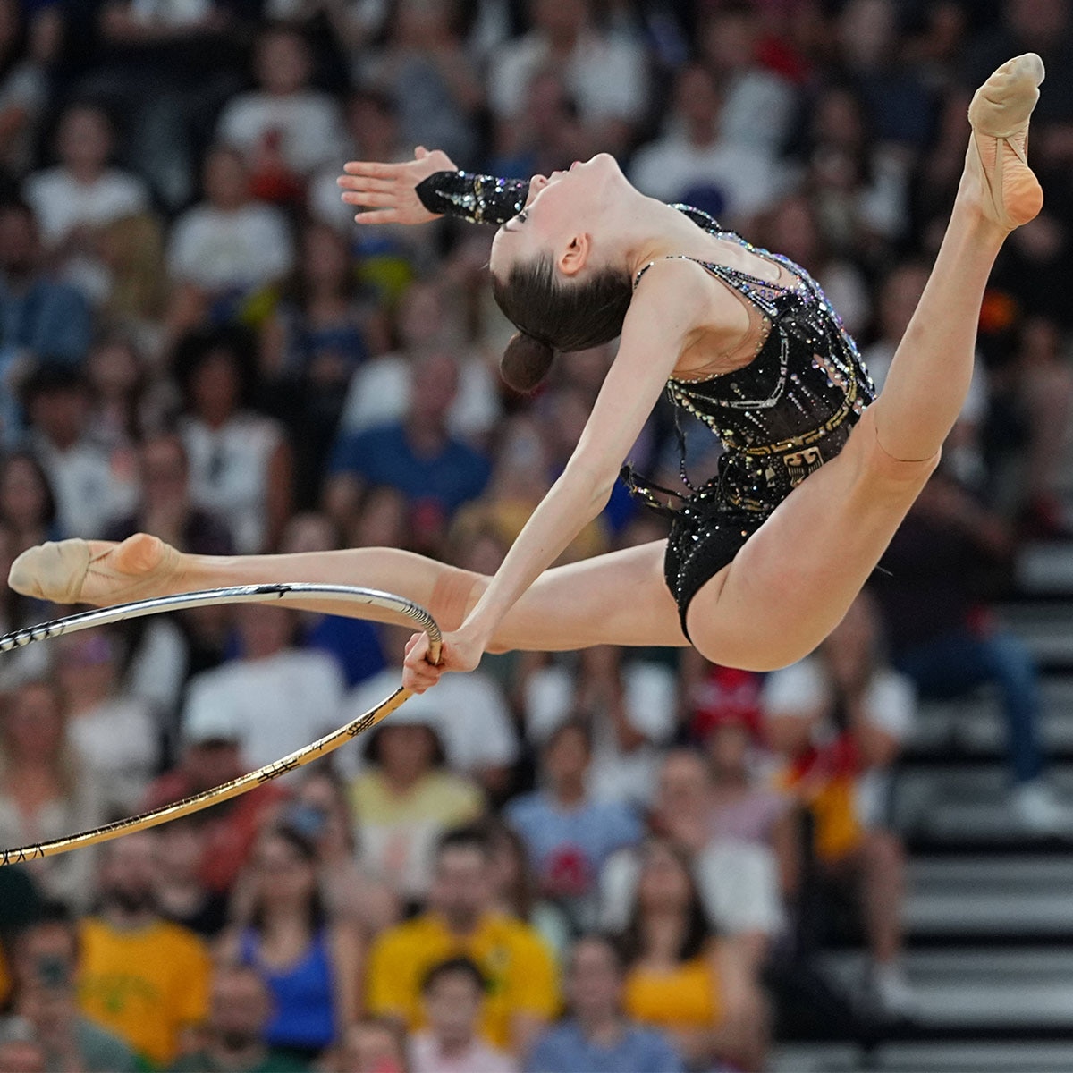 Analice en qué se diferencian la gimnasia artística y la gimnasia rítmica en los Juegos Olímpicos