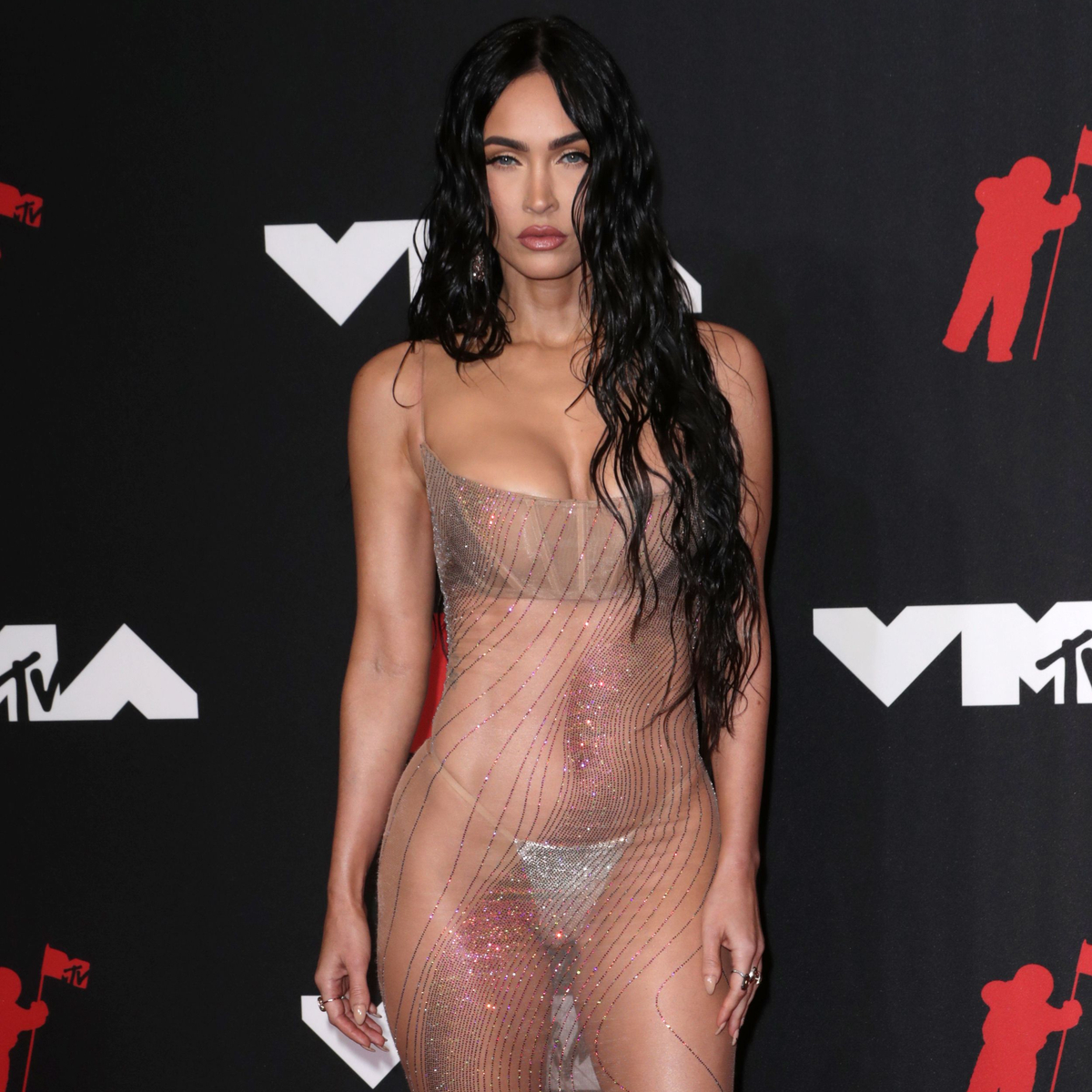 Pregnant Megan Fox Shows Off Baby Bump in Chic Sheer Dress