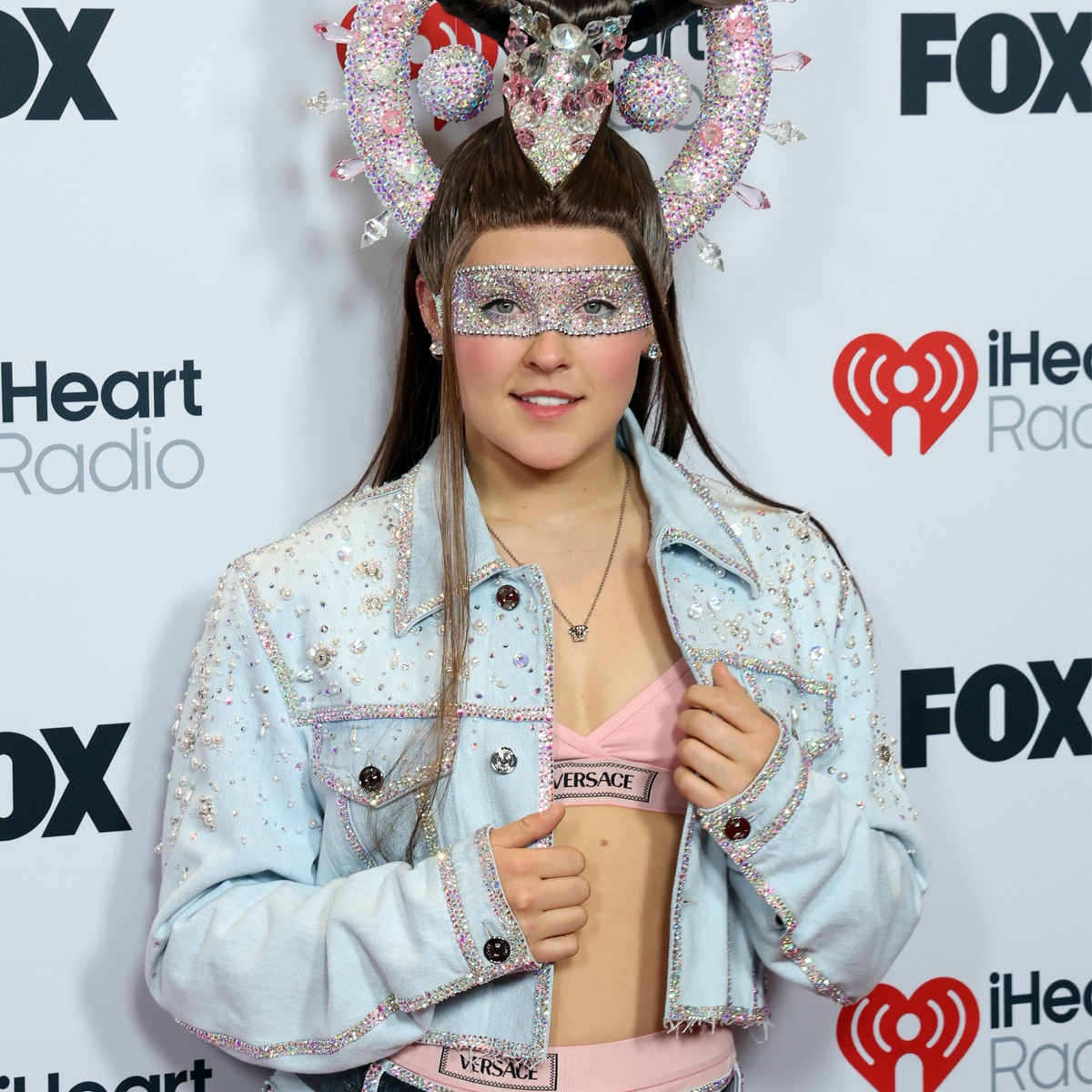 JoJo Siwa arrives at the 2025 iHeartRadio Music Awards red carpet