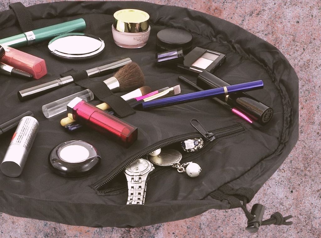 This TikTok-Famous Drawstring Makeup Bag Declutters Your Vanity and Makes Getting Ready So Much Faster 11 Store Lay-n-Plod Cosmo Drawstring Cosmetic & Makeup Earn Organizer