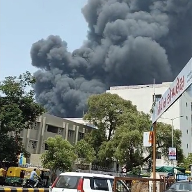 moke rises after a plane crash shortly after takeoff from Sardar Vallabhbhai Patel International Airport in India