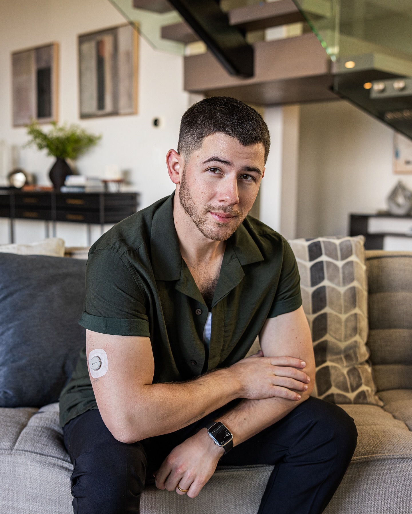 Nick Jonas wearing CGM