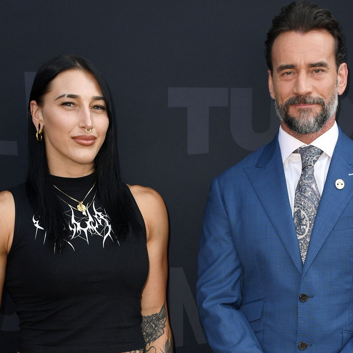 WWE’s CM Punk & Rhea Ripley Reveal How Storylines Really Come to Be