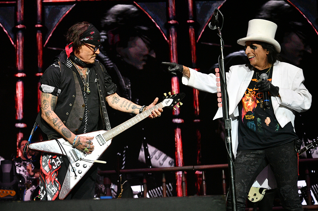 Alice Cooper and Johnny Depp perform onstage during a concert at The O2 Arena