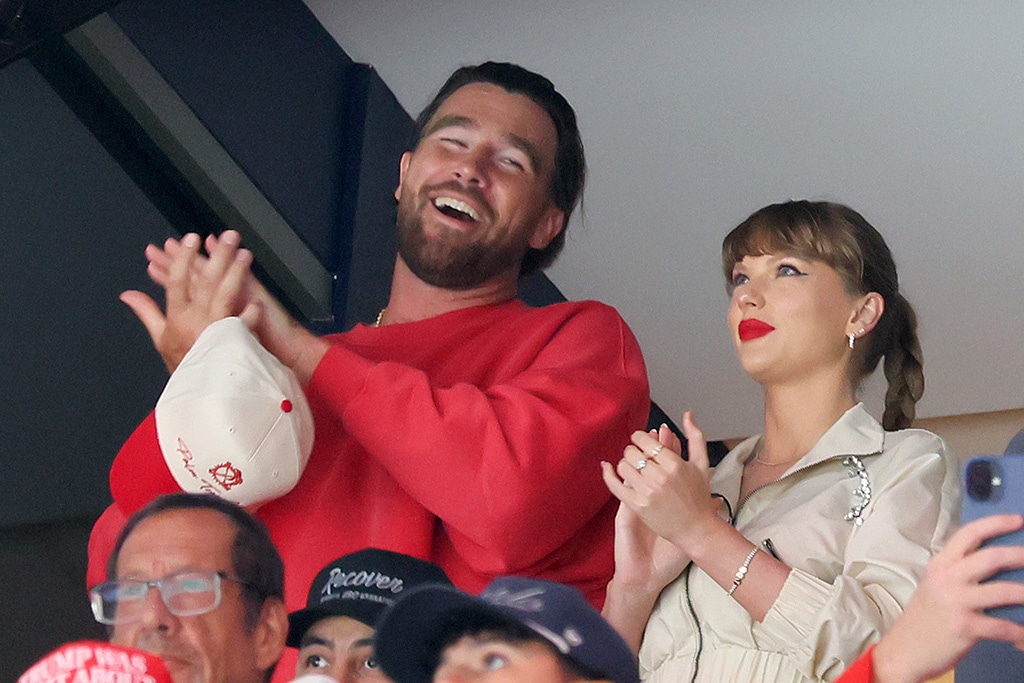 Taylor Swift, Travis Kelce Kiss During New Heights Podcast