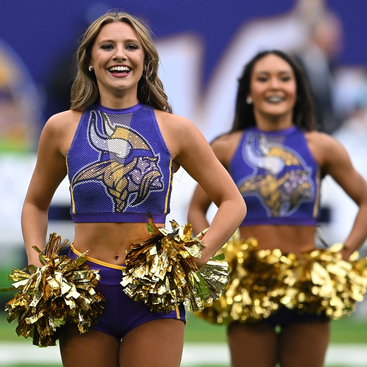 Minnesota Vikings cheerleaders cheer on their NFL team.