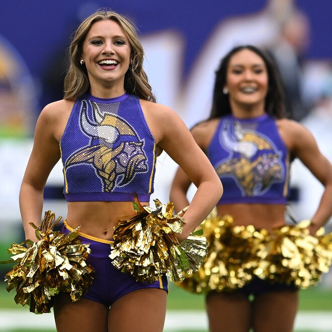 Minnesota Vikings cheerleaders cheer on their NFL team.
