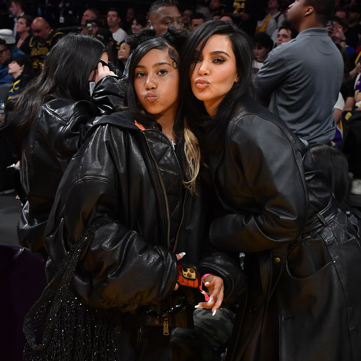 North West Debuts Bridge Piercing and All-Black Grills