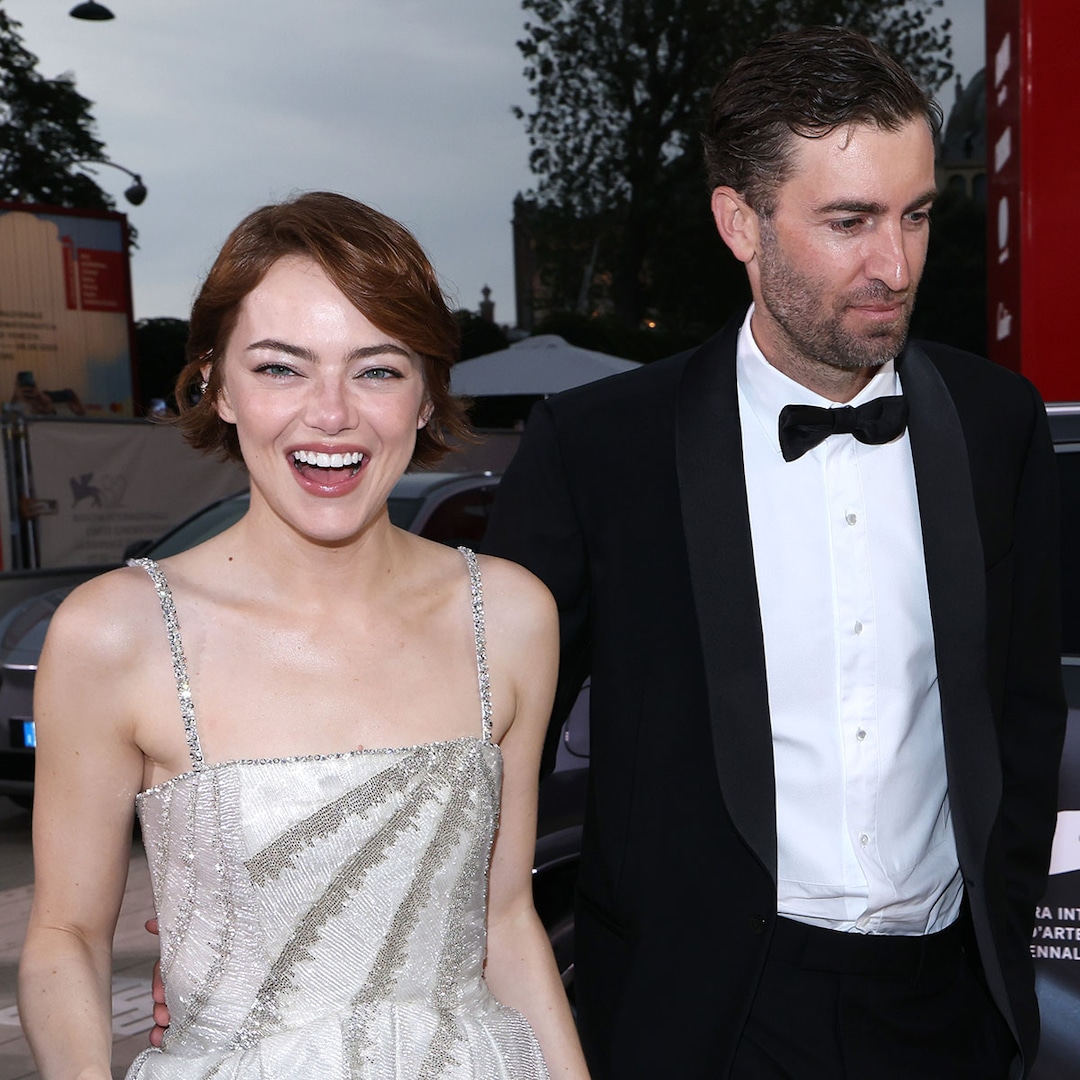 See Emma Stone's Rare PDA With Husband Dave McCary on Red Carpet thumbnail