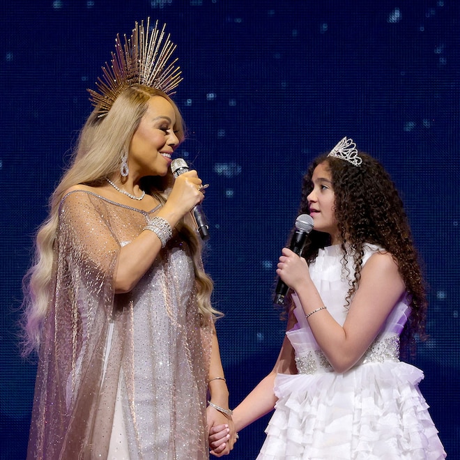 Mariah Carey and daughter Monroe Cannon performing together on stage at Christmas concert, 2023