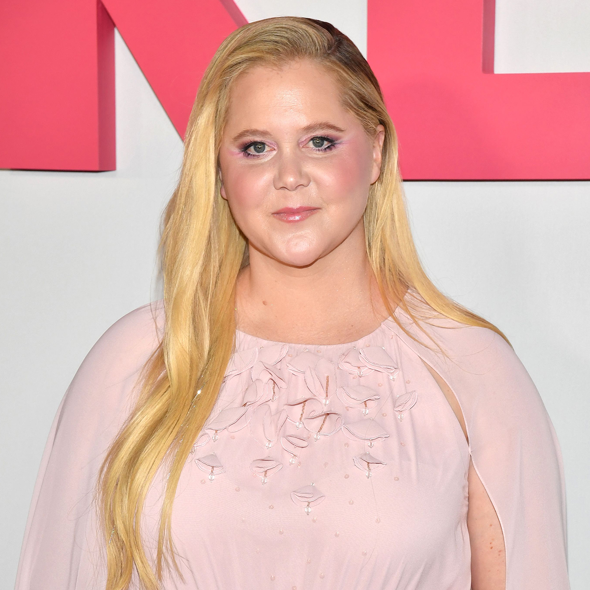 Amy Schumer Bares Toned Stomach After Weight Loss thumbnail