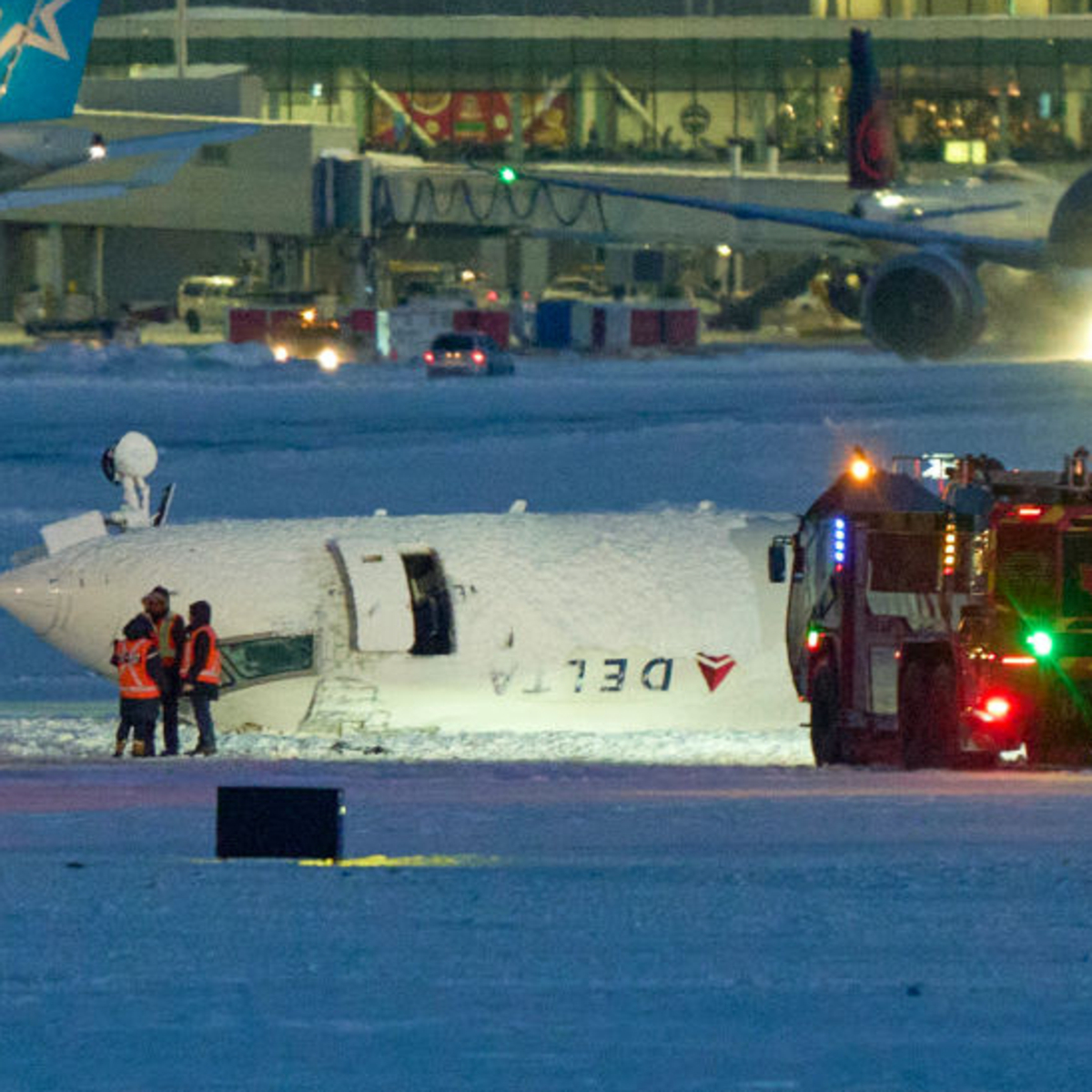 Delta Passenger Speaks Out After Plane Crashes and Flips Upside Down at Toronto Airport - E! Online