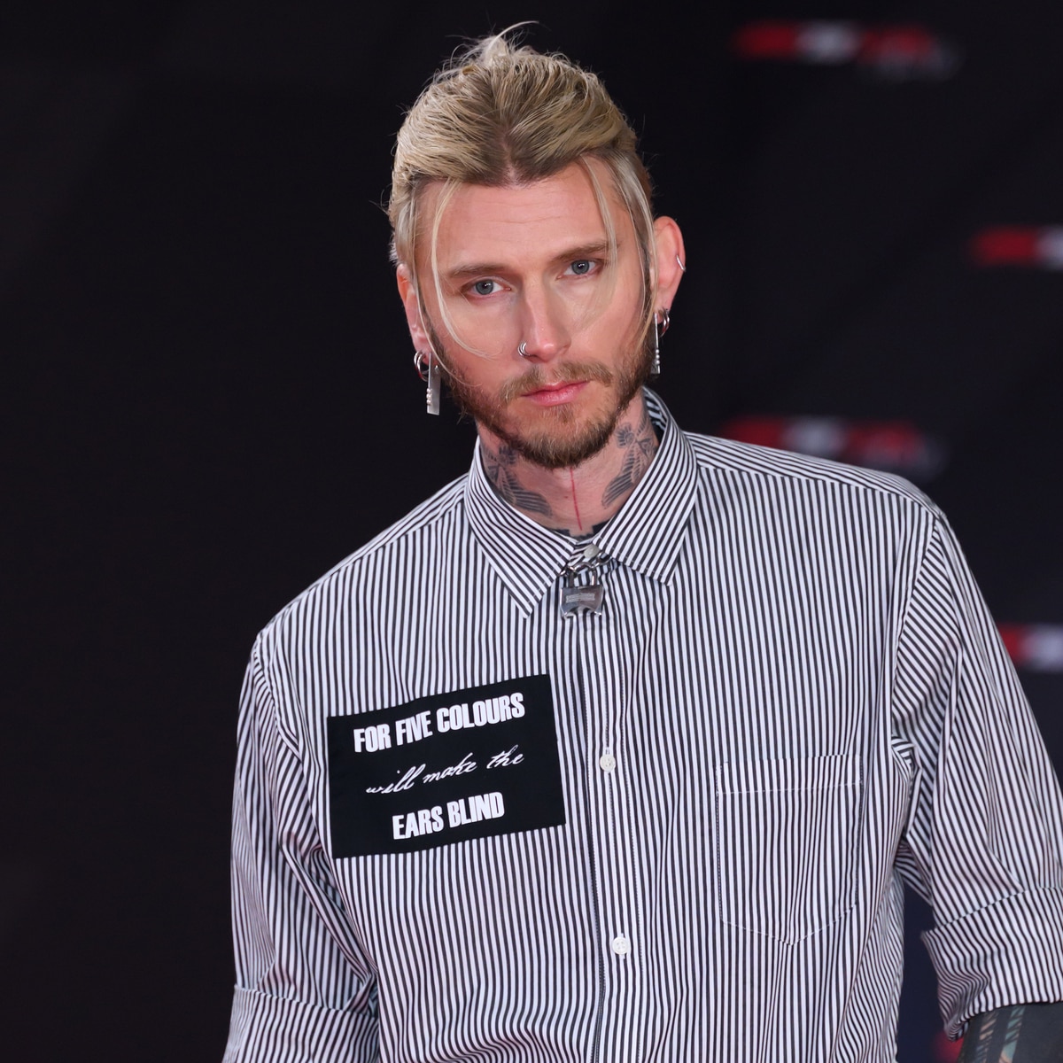 Machine Gun Kelly Reveals New Black-Blonde Split Hairstyle