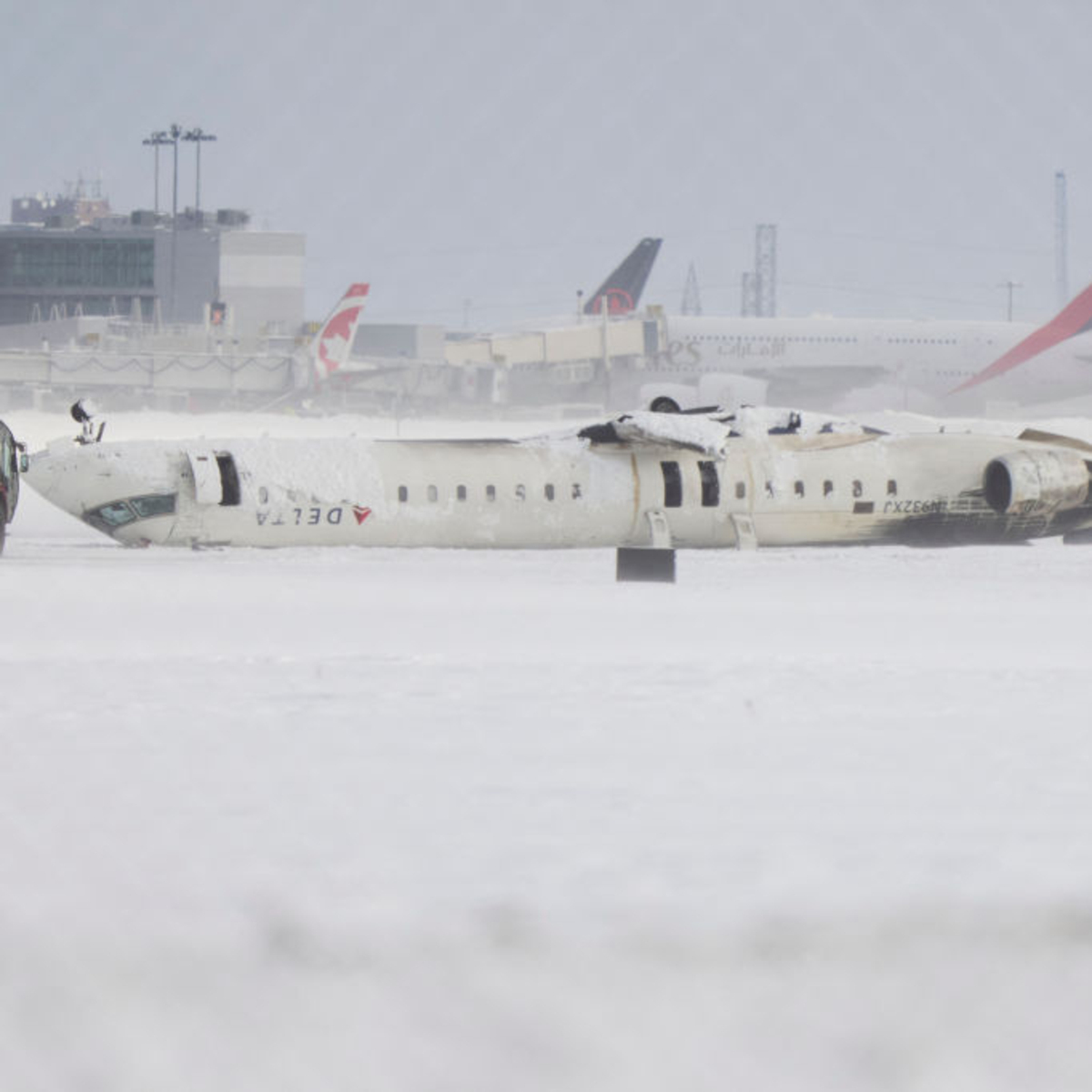 Delta Air Lines Offering $30,000 to Passengers After Toronto Plane Crash Landing - E! Online