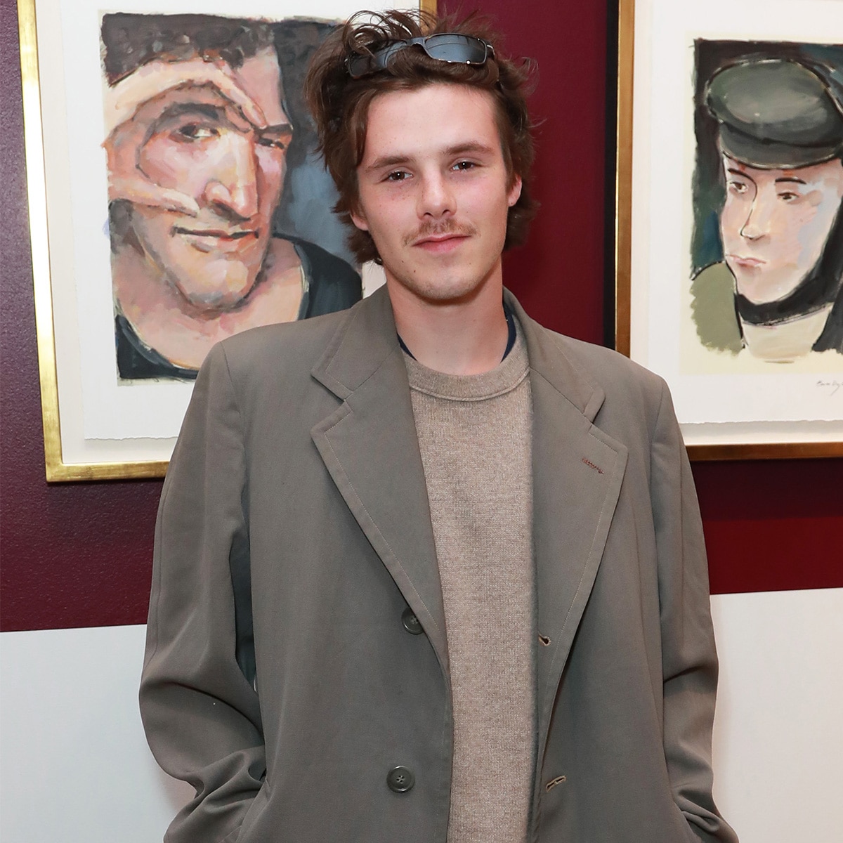 Cruz Beckham attends the a private view of the "Bob Dylan: Point Blank" exhibition hosted by Halcyon Gallery on May 08, 2025 in London, England.