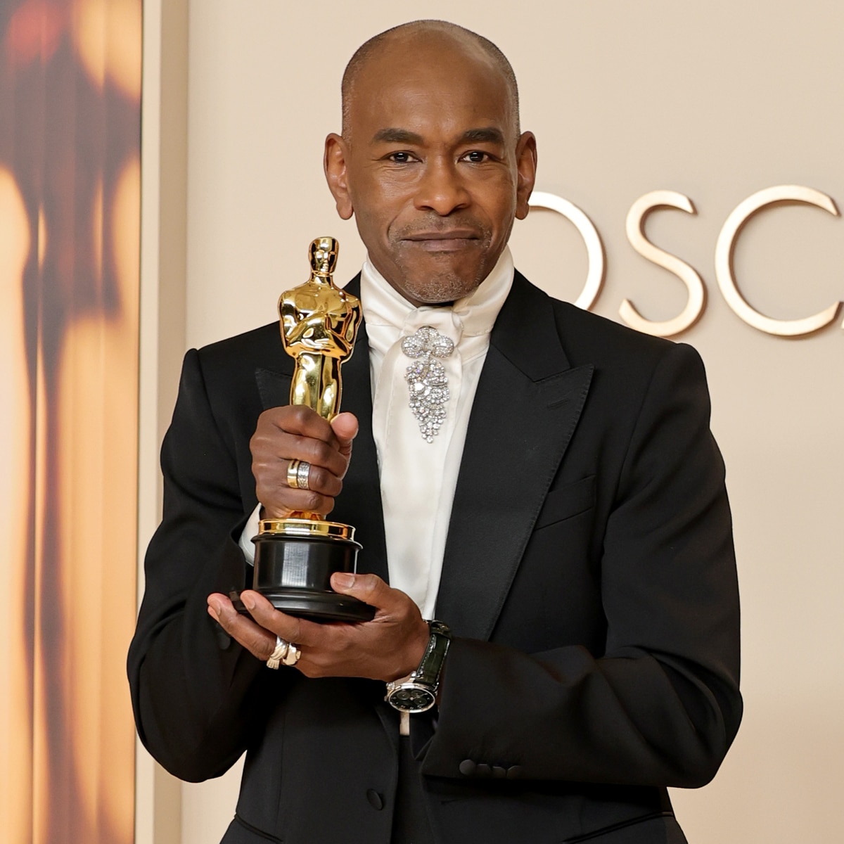 Wicked's Paul Tazewell makes history as the first Black man to win Costume Design at the Oscars.