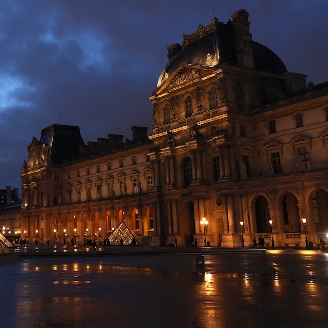 The Louvre museum is pictured at dusk on March 05, 2024 in Paris, France.