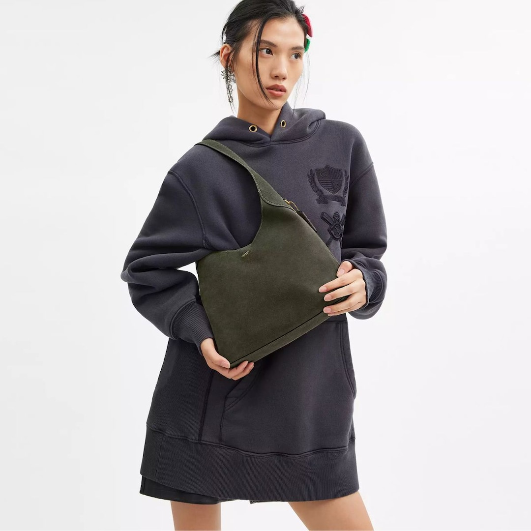 Vendo bolsa tiracolo em camurça Vendo bolsa tiracolo em camurça