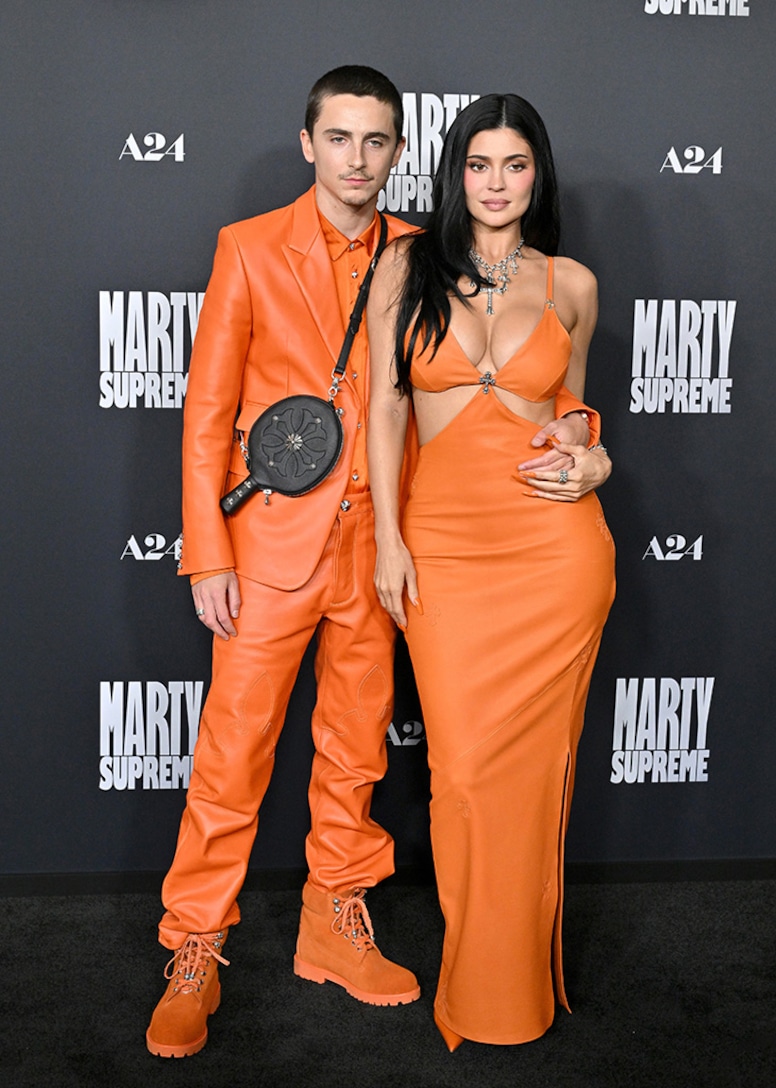 Kylie Jenner, Timothée Chalamet, orange outfit Marty Supreme premiere