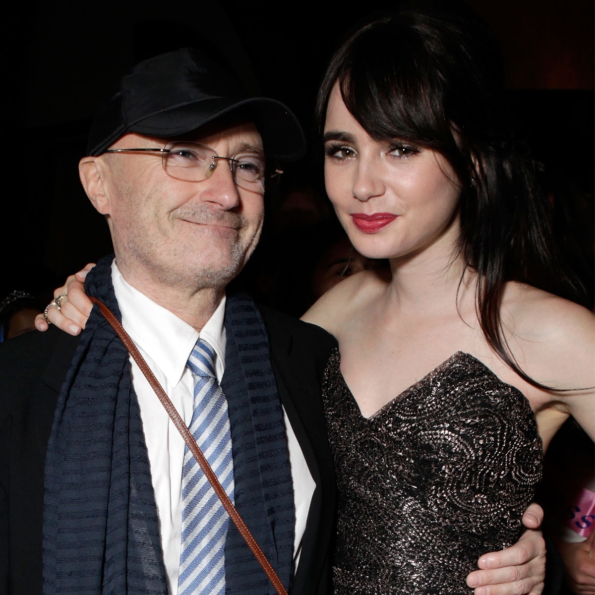 Musician Phil Collins and Actress Lily Collins attend the after party for Relativity Media's "Mirror Mirror" Los Angeles premiere at the Roosevelt Hotel on March 17, 2012 in Hollywood, California.