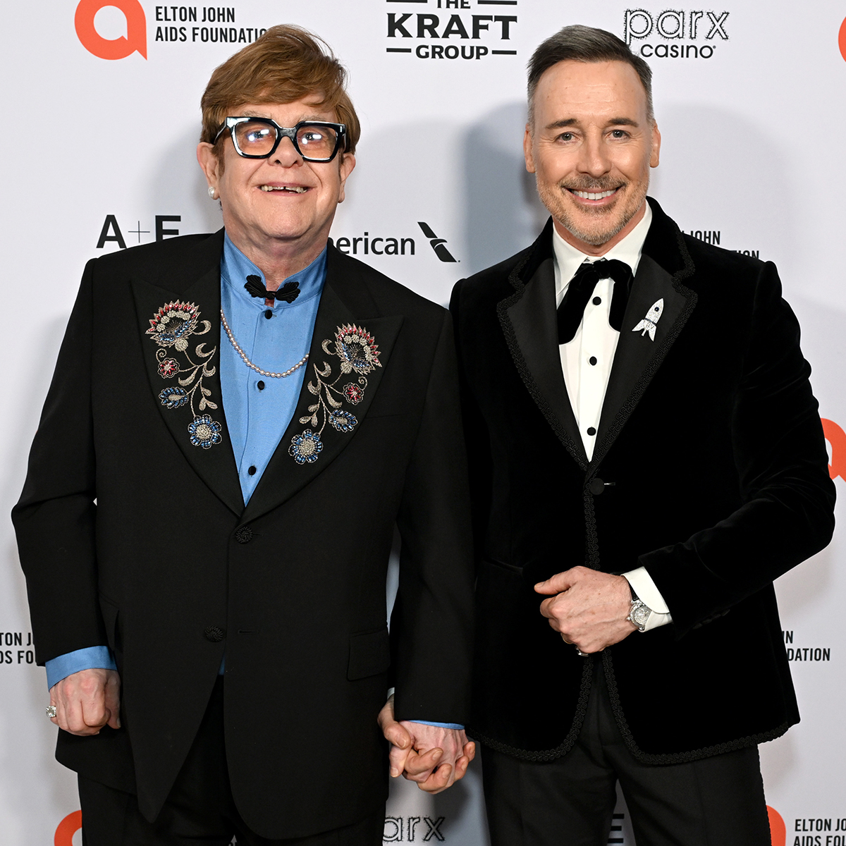 David Furnish Says Elton John Is "Battling on" After Health Issues