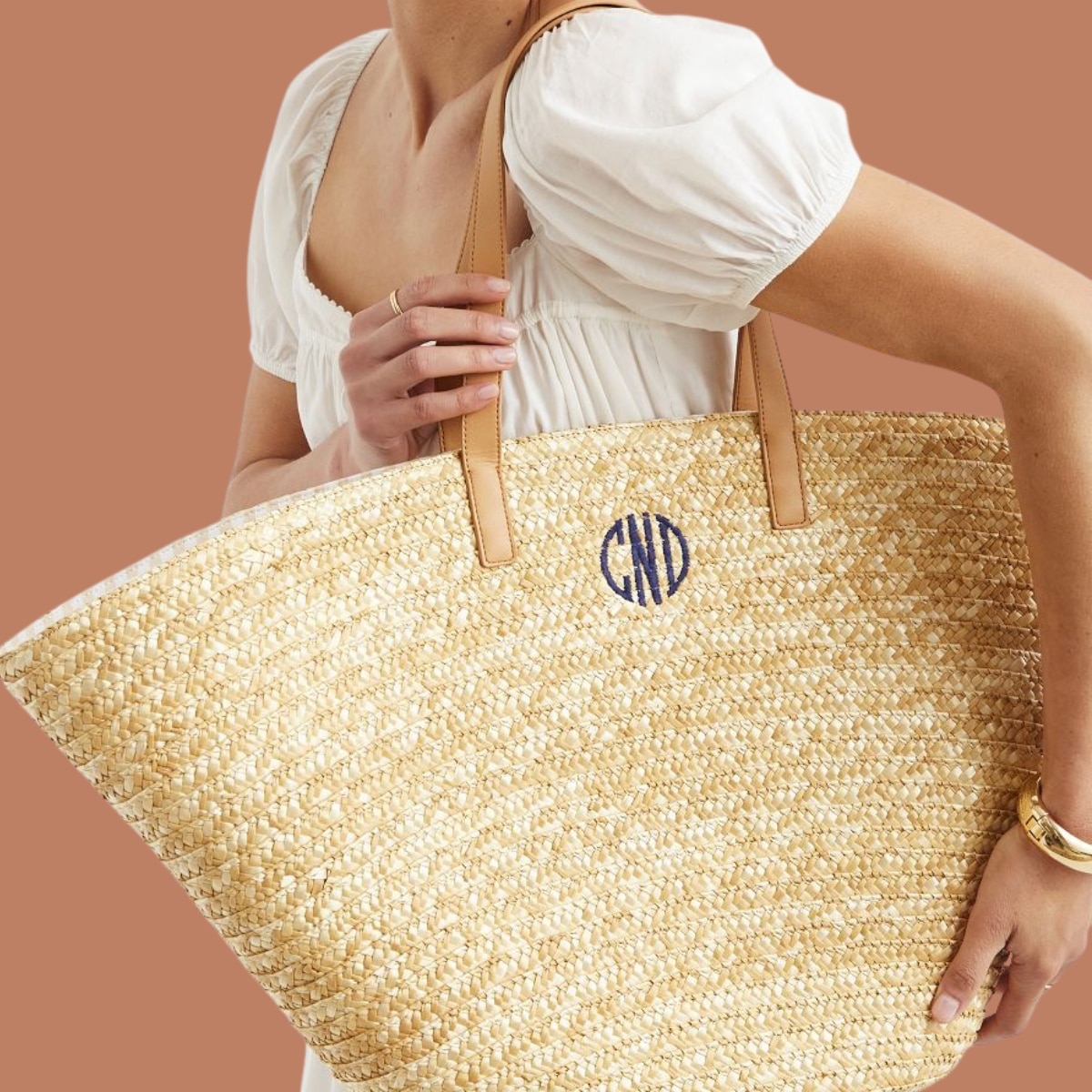 eonline.com - Need More Space? These Large Beach Bags for Summer 2026 Fit Towels, SPF & More