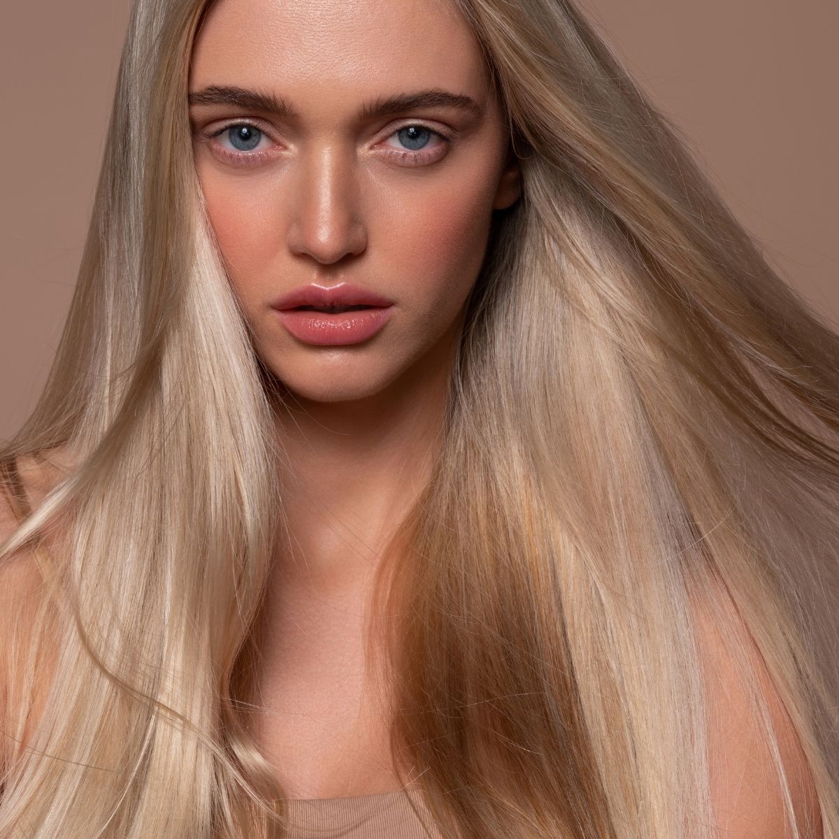 Sleek, Smooth Hair With Frizz-Fighting Oils, Creams, Conditioners