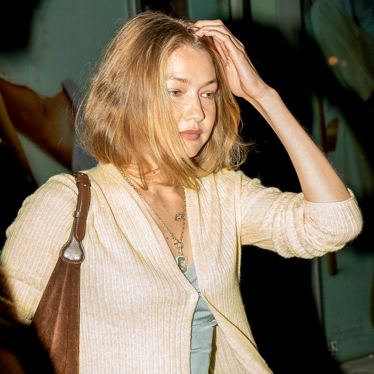 Gigi Hadid’s Bradley Cooper Gold Dog Tag Necklace: Cost & More Details